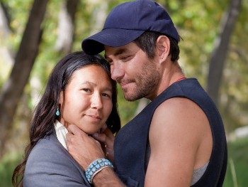 Indigenous-couple-hugging-outside