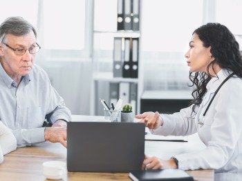 Doctor-talking-with-elderly-patient